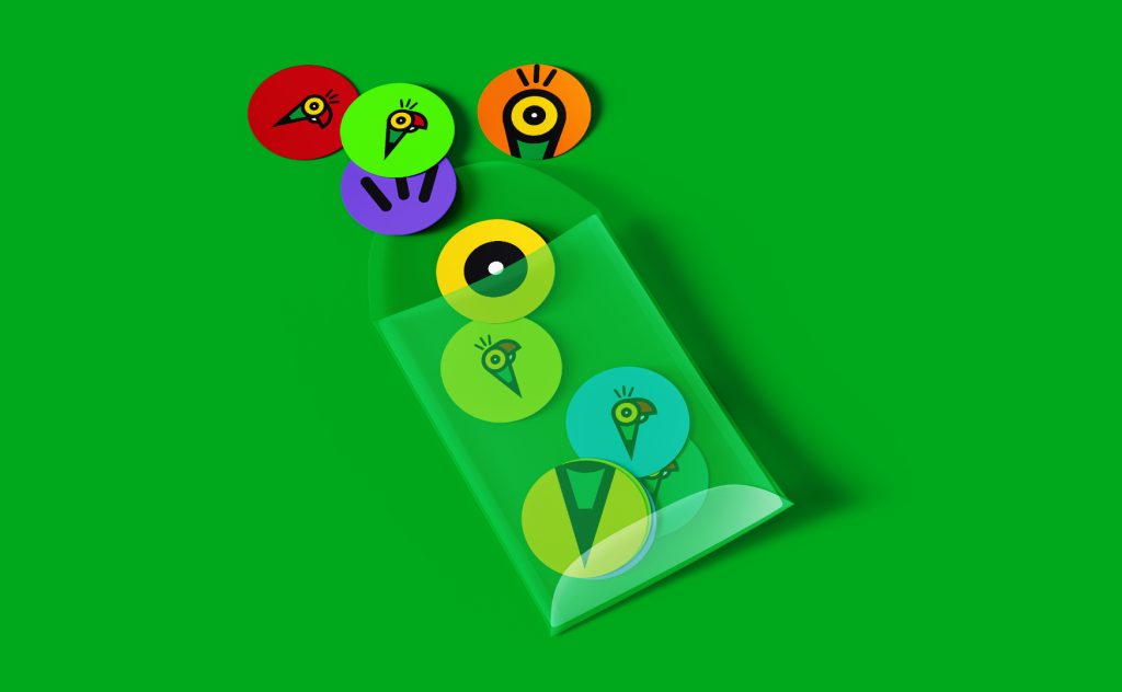 Colorful round badges with CAScopy parrot logo inside a green transparent pouch on a green background.