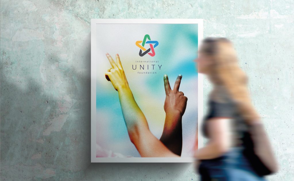 Unity Foundation logo design on peace poster with hands showing victory sign