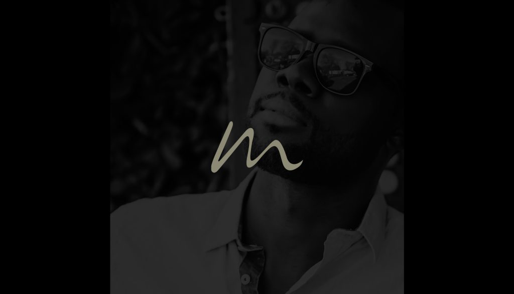 Meraki logo on portrait of man wearing modern sunglasses